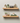 Pack of 2 oak floating shelves, wall-mounted in a modern living room