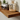 Close-up of handcrafted walnut floating shelves, showing rich wood grain