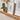 Detailed view of a walnut picture ledge shelf, showing wood character and grain.